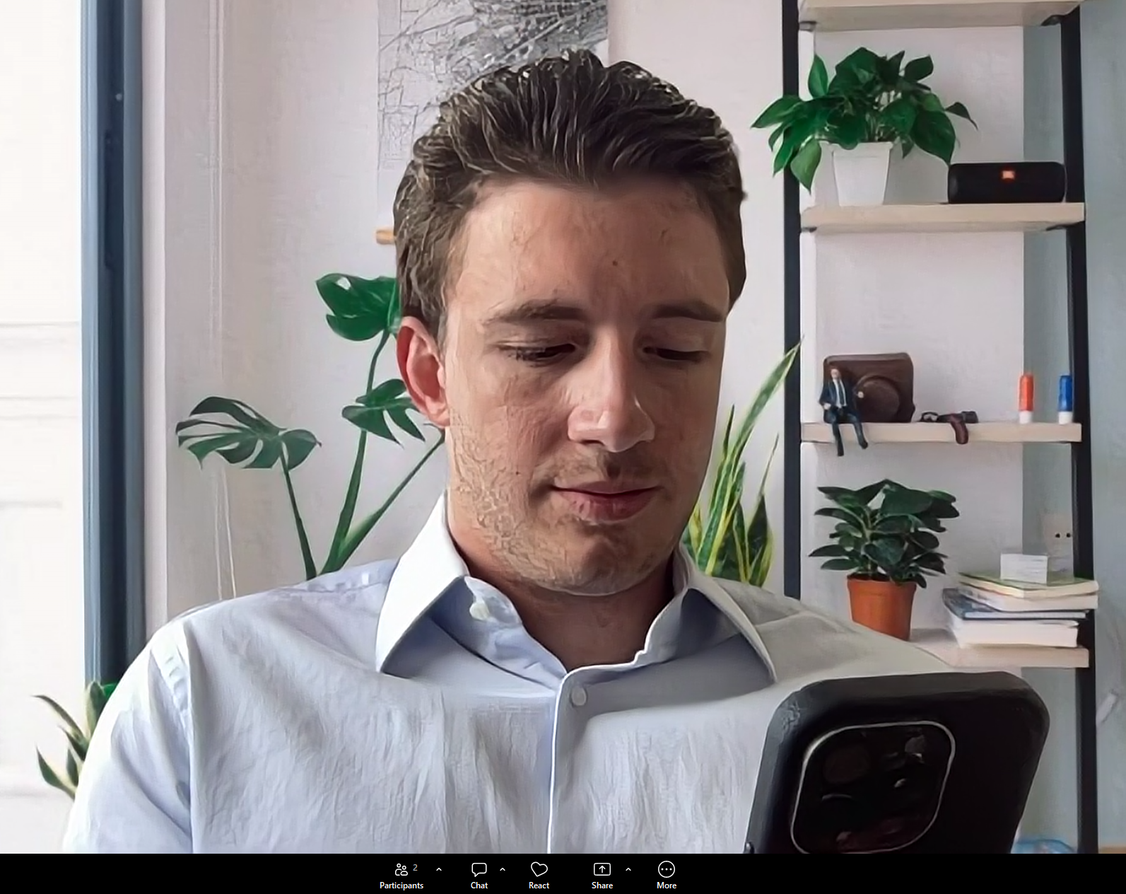 Candidate looking off-screen at a secondary device